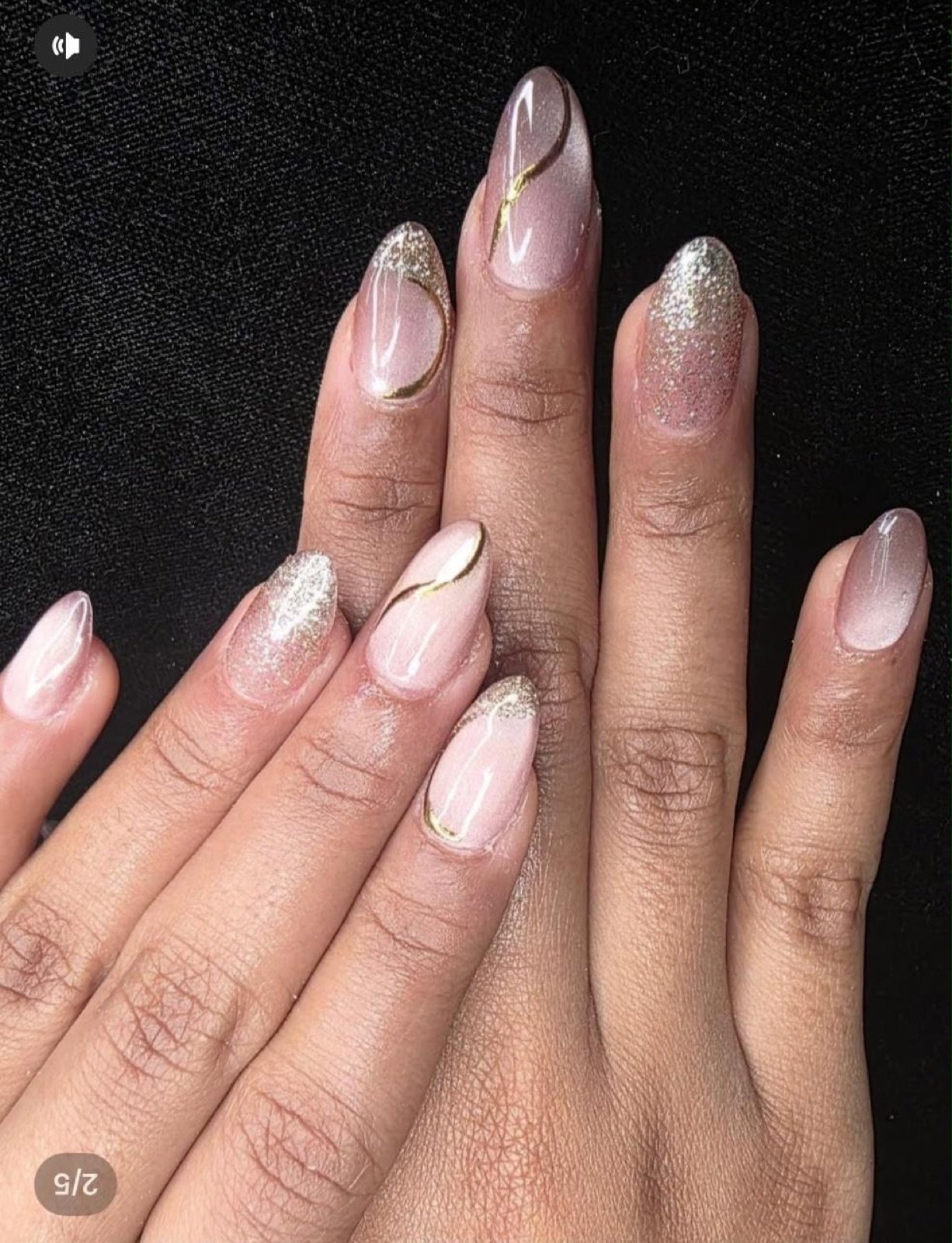 Elegant nude almond nails with gold-foil art and glitter